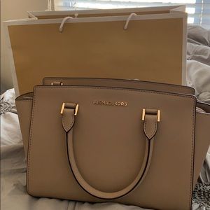 Micheal Kors medium sized purse.